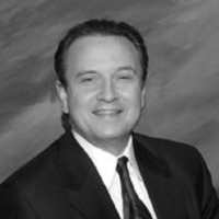 Dr. J Jerome Smith