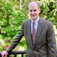 Dr. Nicholas  Tretter
