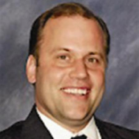 Dr. John F. Regis