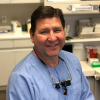 Dr. Keith E Russell