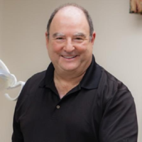 Dr. Louis  Stylos