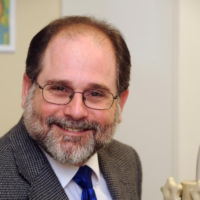 Dr. Timothy J Delcambre
