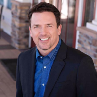 Dr. Adam John McKissock