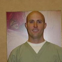 Dr. Mark E Fisher