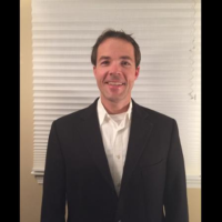 Dr. Chris M Poulos
