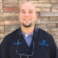 Dr. John J Candelaria