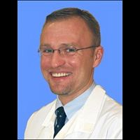 Dr. Cezar M Mitrut