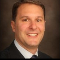 Dr. John L Aurelia