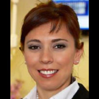 Dr. Ina  Daci