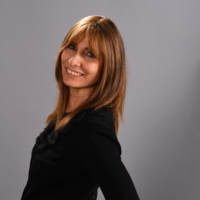 Dr. Mitra  Adams