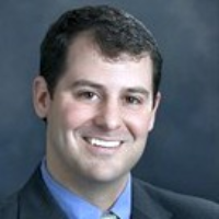 Dr. Adam M Hogan