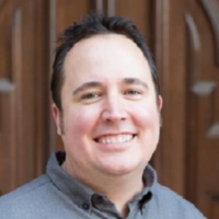 Dr. Mark E Harris