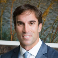Dr. C Elliott Maxwell