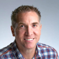 Dr. Travis  Lambert
