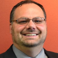 Dr. CHRISTOPHER Scott CARROLL