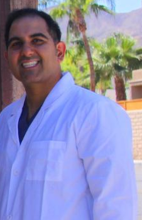 Dr. Andrew  Rastegar