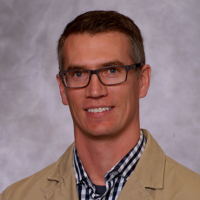 Dr. Eric Todd Carlson