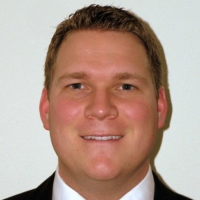Dr. Adam T Clark