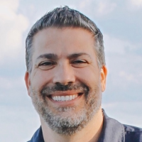 Dr. Justin R Chisari