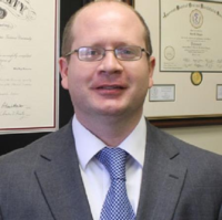 Dr. Joel  Dragoo