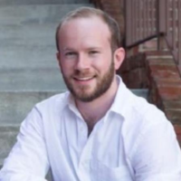 Dr. Justin M Hughes