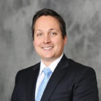 Dr. Christopher M De La Mater
