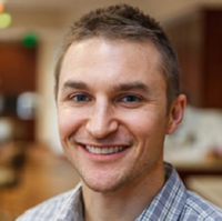 Dr. Adam M Timock
