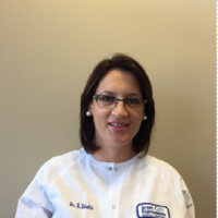Dr. Odeta  Dinella-Manushi