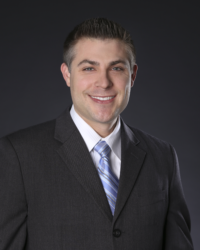 Dr. Benjamin  Tindal