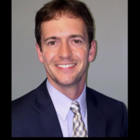 Dr. Christopher William Calnon