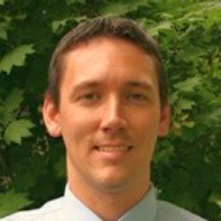 Dr. Travis  Hunsaker