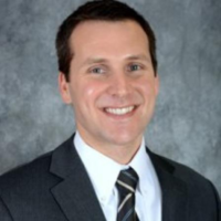 Dr. Christopher E Koehn