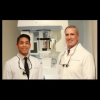 Dr. Colin K Au