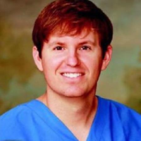 Dr. John B Carlton