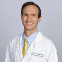 Dr. Mathew K Woodward
