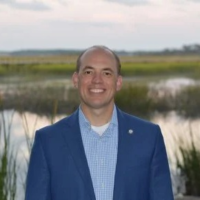 Dr. Darron R Alvord