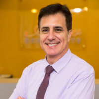 Dr. ADRIAN  MOBILIA