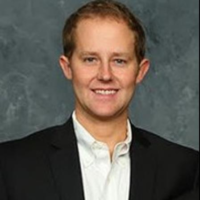 Dr. Christian D Meland