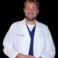 Dr. John M Nakhla