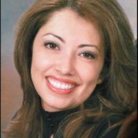 Dr. Claudia  Piccolo