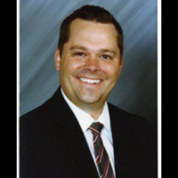 Dr. Aaron M Baumler