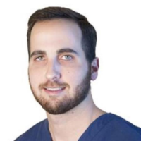 Dr. Andrew J Doucet