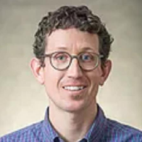 Dr. Aaron  Van Wyk