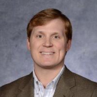 Dr. Travis Edward Walding