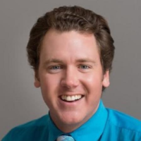 Dr. Andrew J Baker