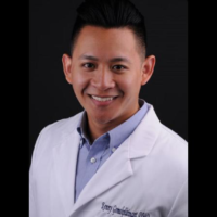 Dr. Kenny M Gomolplitinant
