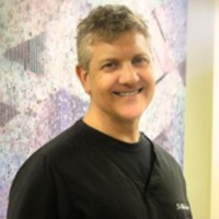 Dr. Michael  Simmons