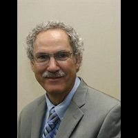 Dr. Louis E Schwarzbach