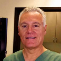 Dr. Aris  Corkos