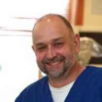 Dr. Andrius E Uzpurvis